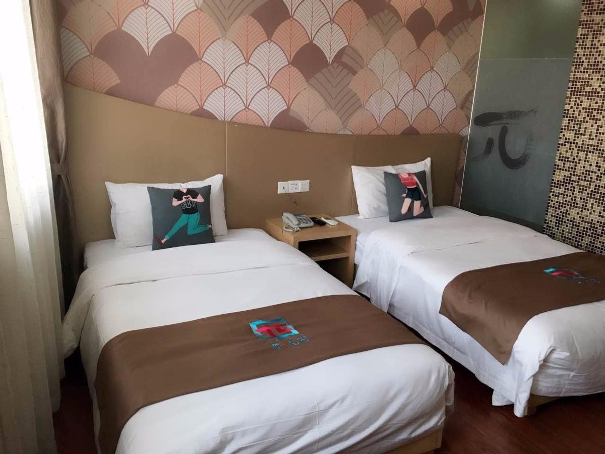Pai Hotel Heze Dingtao Wantai City Exterior photo